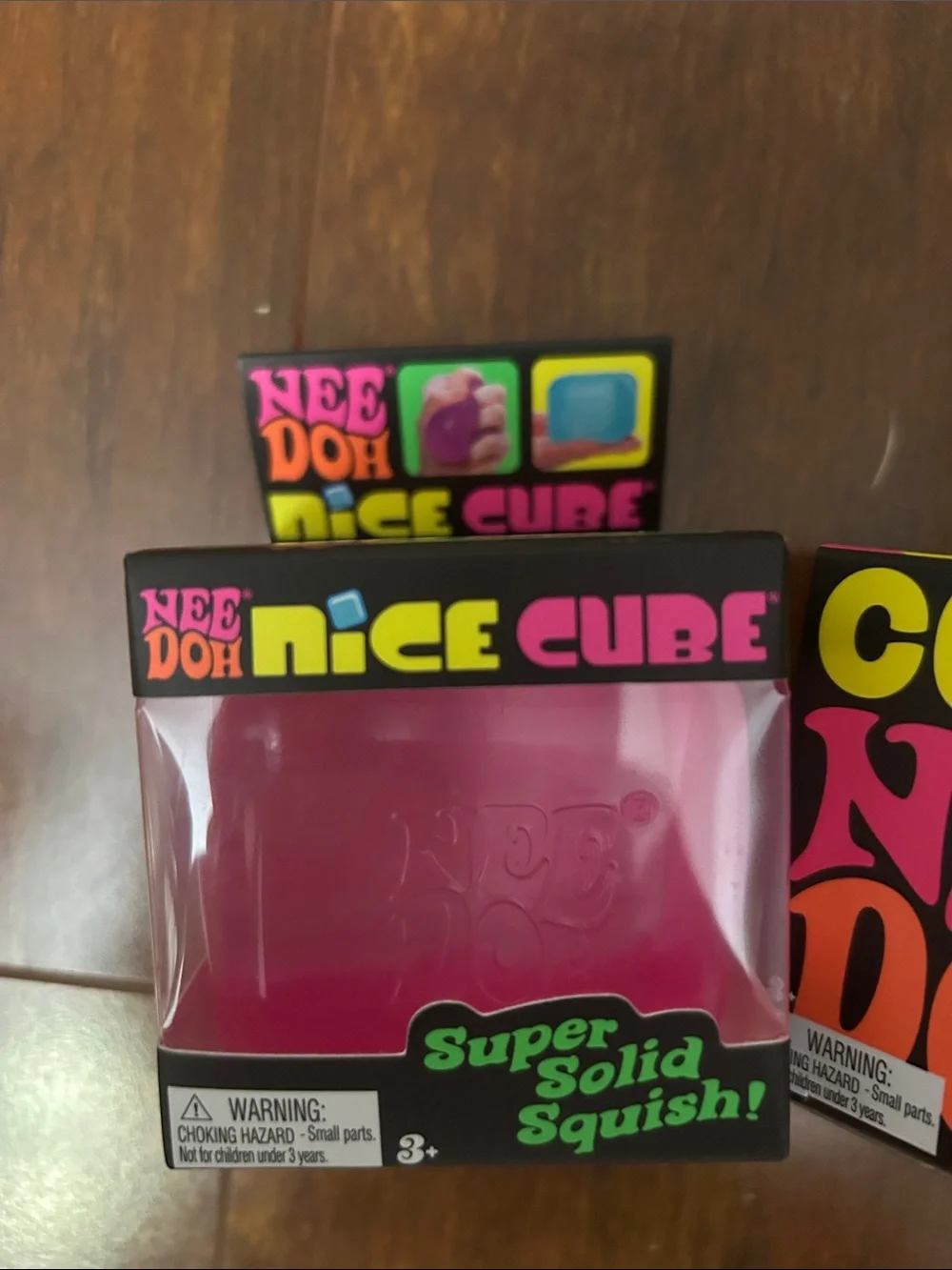 (3) Nee Doh Squishies.   Pink Nice Cube, Pink Color Change and Purple Fuzz Ball